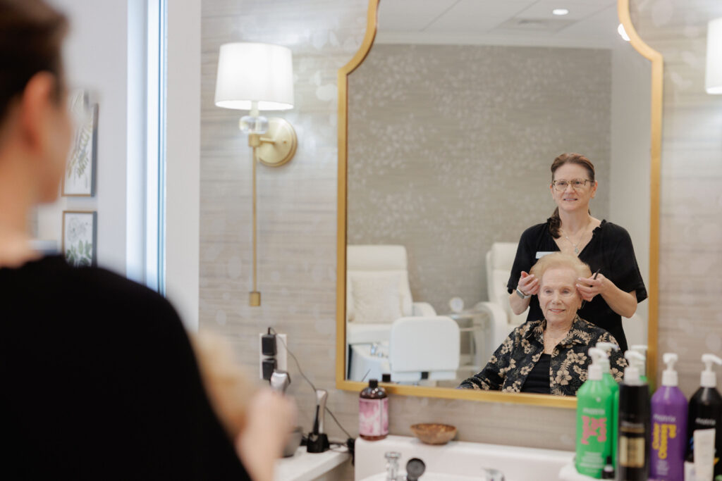 Senior woman getting her hair done